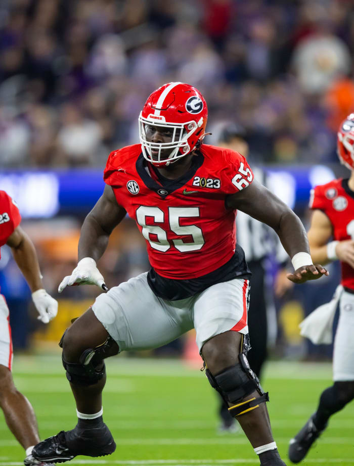 Jan 9, 2023; Inglewood, CA, USA; Georgia Bulldogs offensive lineman Amarius Mims (65) against the TCU Horned Frogs during the CFP national championship game at SoFi Stadium. Mandatory Credit: Mark J. Rebilas-USA TODAY Sports